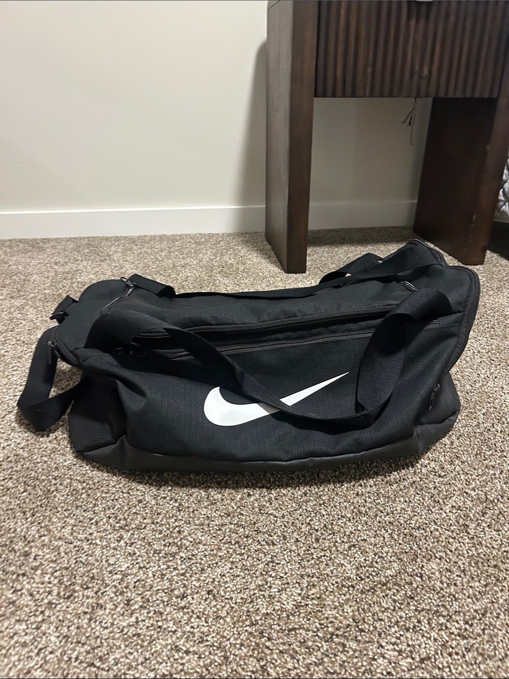 Nike Black Duffel Bag with White Swoosh